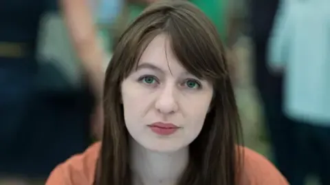 The acclaimed novelist declares she will not travel to the UK over legal concerns